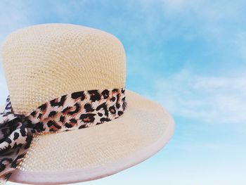 Close-up of hat against sky