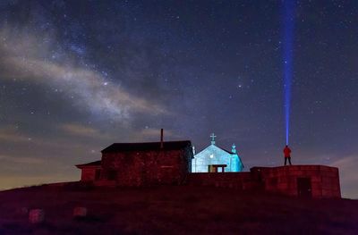 Low angle view of house against sky at night