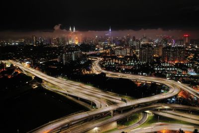 High angle view of illuminated city at night