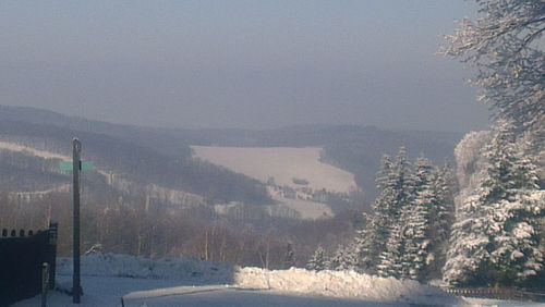 Scenic view of mountains against sky during winter