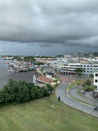 High angle view of road by sea against sky