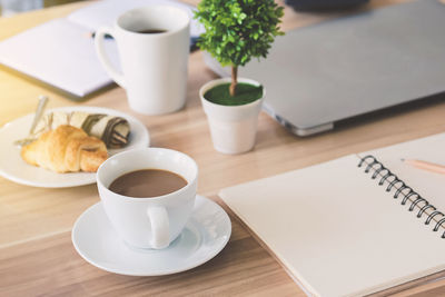 Coffee cup on table