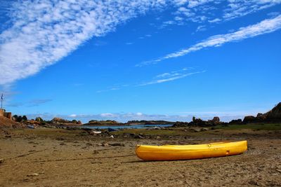 Panoramic view of beach against blue sky