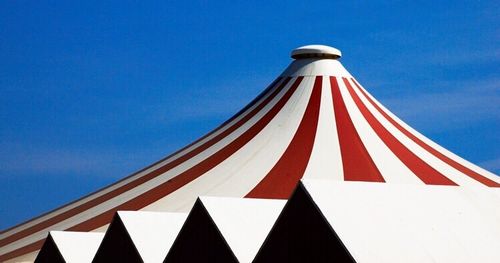 Low angle view of built structure against blue sky