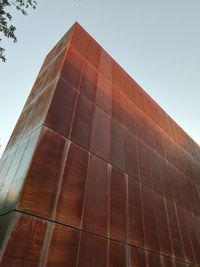 Low angle view of modern building against clear sky