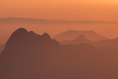 Layer of mountains with misty in morning