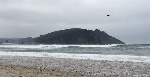 Scenic view of beach against sky