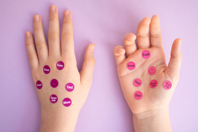 Hands with stickers on