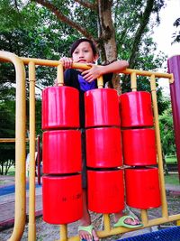 Portrait of happy girl playing on playground