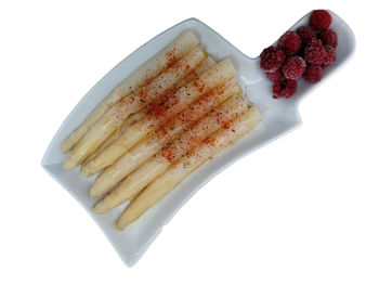 Close-up of cake against white background