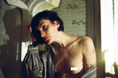 Close-up of woman standing in pond