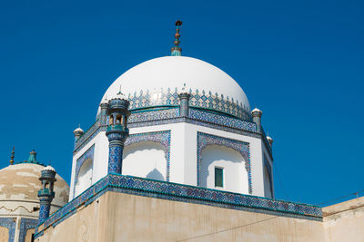 Low angle view of a building against blue sky