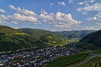 Aerial view of townscape against sky