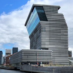 Low angle view of modern building against sky