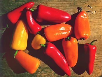 Close-up of red chili peppers on table