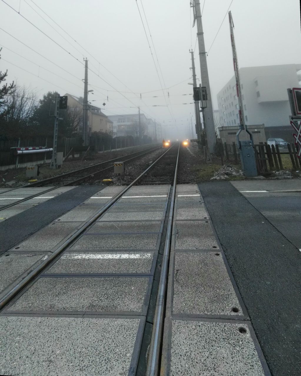 transportation, power line, electricity, railroad track, cable, sky, power supply, no people, rail transportation, electricity pylon, outdoors, connection, day, public transportation, tree