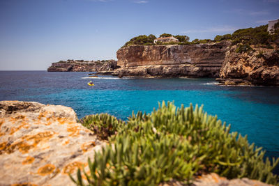 Scenic view of sea against clear sky