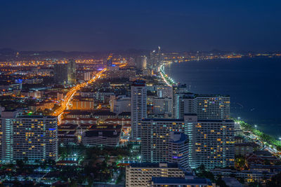 High angle view of illuminated city buildings