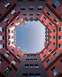 Low angle view of buildings against clear sky