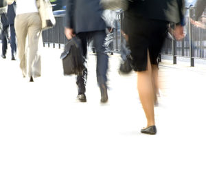 Low section of people walking outdoors