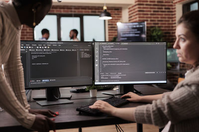 Midsection of man working at office