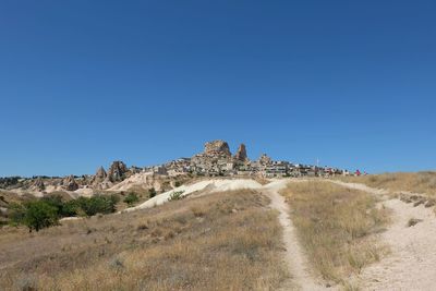 Scenic view of mountain against clear blue sky