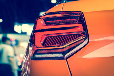 Close-up of red car against sky