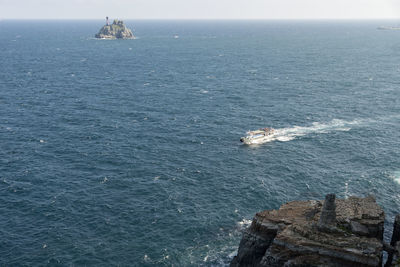 High angle view of boat sailing on sea