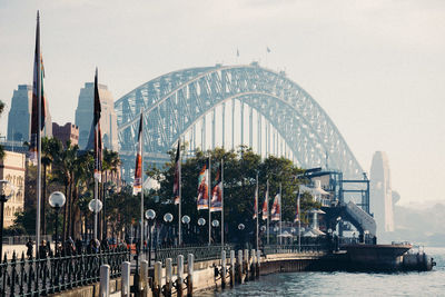 Tourists on bridge in city