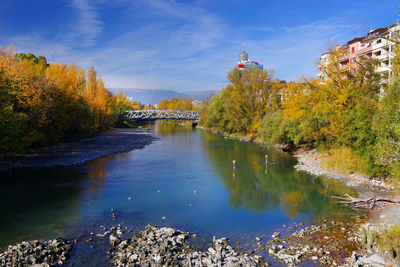 View of bridge over river during autumn