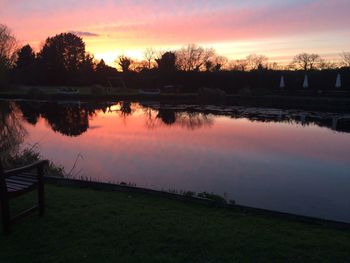 Scenic view of lake during sunset