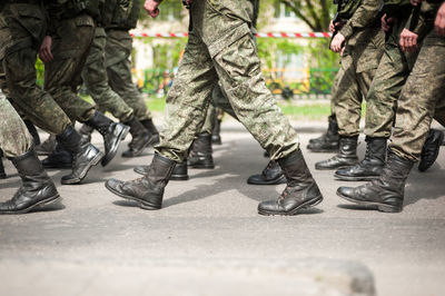 Marching soldiers in military boots