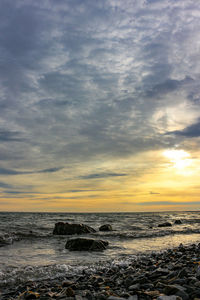 Scenic view of sea against sky during sunset