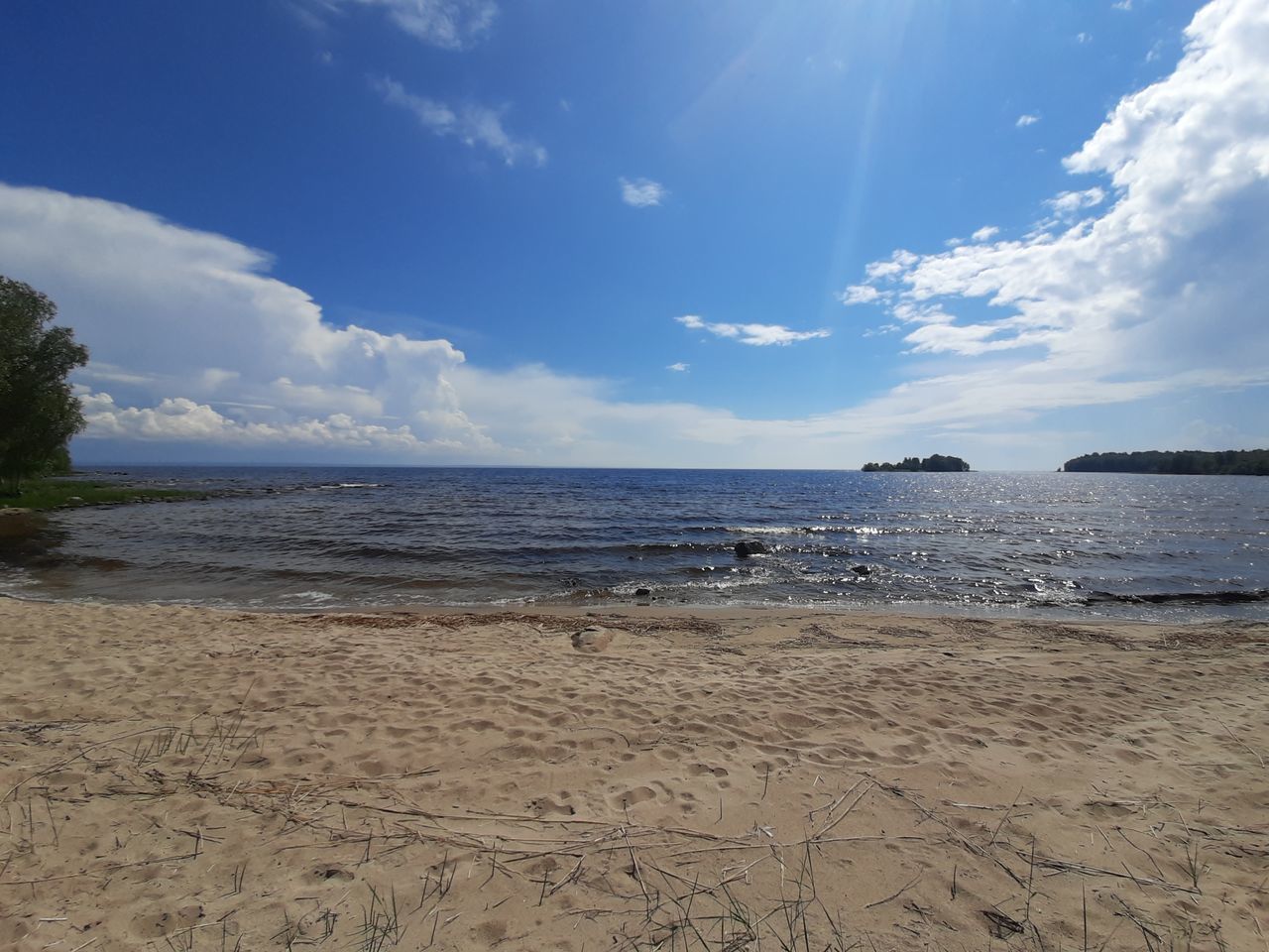 VIEW OF BEACH AGAINST SKY