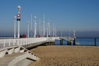 Pier on sea against sky