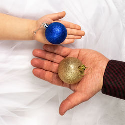 Cropped hand of woman holding easter egg