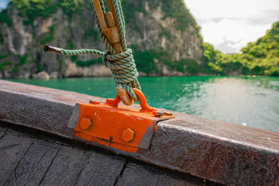 Person by river against blurred background