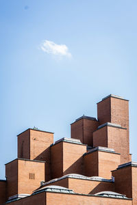 Low angle view of building against clear blue sky