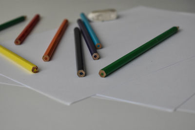 Close-up of colored pencils on table