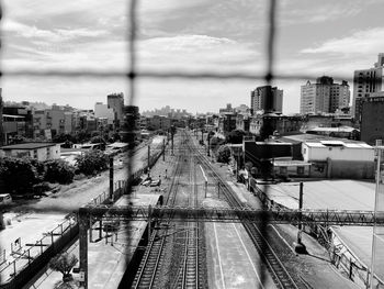 Track behind fence