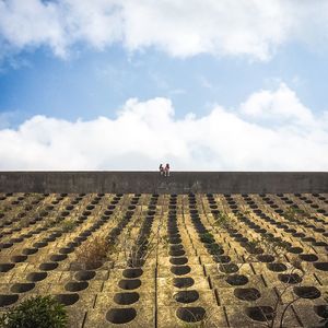 People walking on landscape