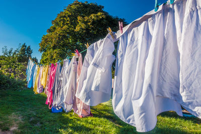 Panoramic shot of clothes drying on field