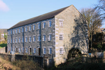 Low angle view of old building against sky