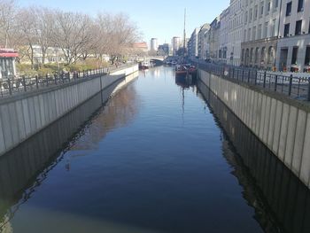 Footbridge over canal in city
