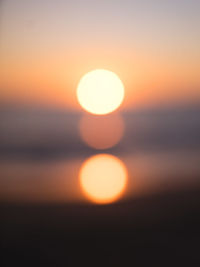 Close-up of sun against sky during sunset