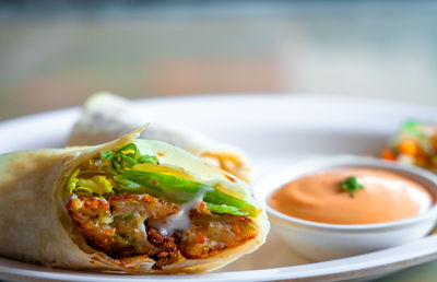 Close-up of food served on table