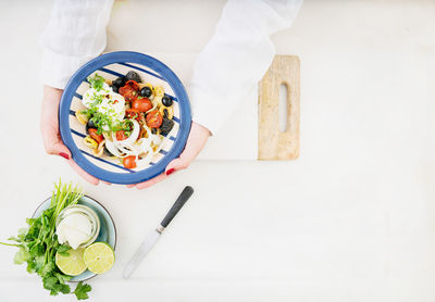 High angle view of breakfast served on table