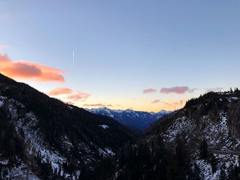 Scenic view of mountains against sky during sunset