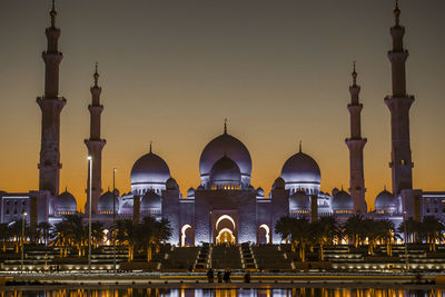 Illuminated mosque at night