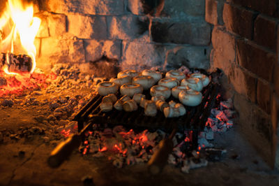 High angle view of meat on barbecue grill